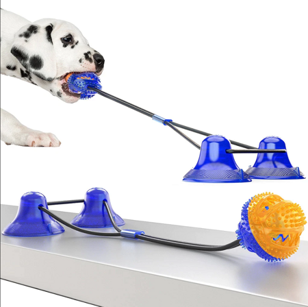 Zabawka na przysmaki dla psa gryzak z dozownikiem karmy, z dwiema przyssawkamii niebiesko-pomarańczowa